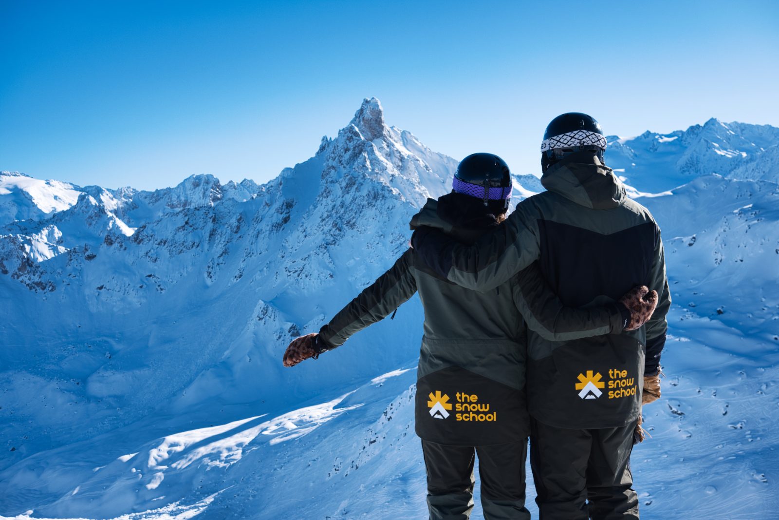 A group skiing together in the sunshine